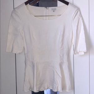 T. Babaton peplum top